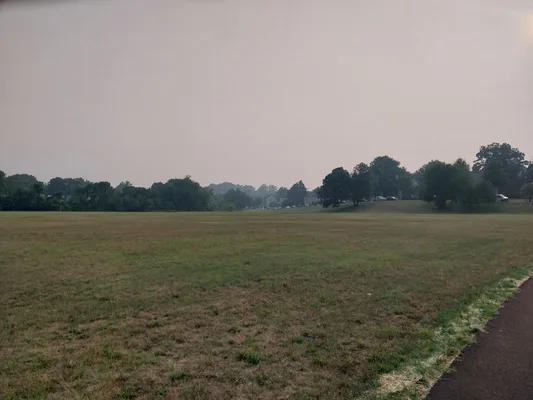 Fields at Chillum Community Park blanketed in Canadian wildfire haze.